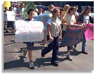 High school students march to their meeting.