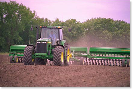 Bill Christison prepares a field to plant soybeans on his farm near Chillicothe, Missouri. Photo by Nic Paget-Clarke.