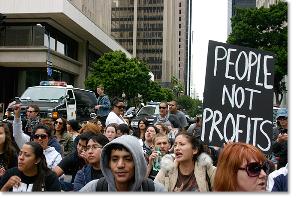 May Day 2012, San Diego, California. -- Students sit down and take the street for theirs in front of Bank of America and Wells Fargo. Photo by Nic Paget-Clarke.