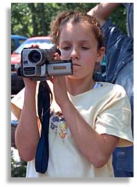 A student videos the protest.