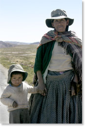 Llama herder Aurora Achonina with Miguel Choque-Acho on the Altipano, Oruro department.