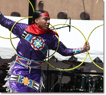 Tony Duncan, Hoop Dancer, at an event during the Santa Fe Indian Market. Photo by Nic Paget-Clarke. 
