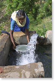 A villager collecting water from a well in western Tamil Nadu. 