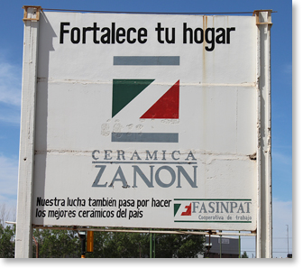 A sign by the front gate of Zanon.