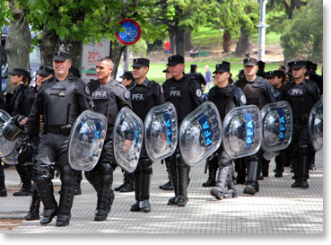 Argentina Federal Police prepare to leave after the lengthy march through central Buenos Aires by the excluido march by Movimiento de Pie. Photo by Nic Paget-Clarke.