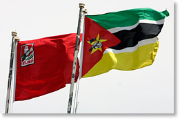 The national flag of Mozambique (right) and the FRELIMO flag.