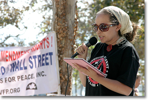 Cathy Mendonça speaking at the one-year anniversary of Occupy San Diego in an event co-sponsired with Veterans for Peace to mark the 11th anniversary of the beginning of the war in Afghanistan. Photo by Nic Paget-Clarke.