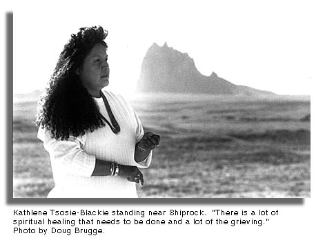 Kathlene Tsosie-Blackie standing near Shiprock - Photo by Doug Brugge