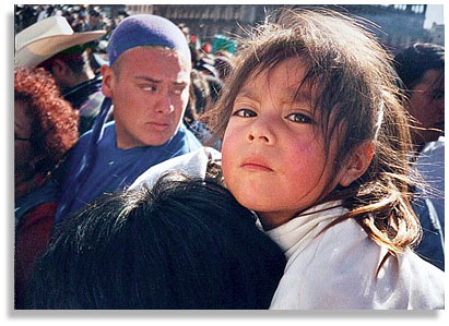 Chica en el Zocalo. Over 250,000 people gathered in the Zocalo of Mexico City on March 11, 2001 to listen to the words of la comandancia on the last day of the Zapatista Caravan. Photo by Danny Turner-Lloveras.
