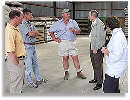 Bill Christison with speaking with farmers Stephen Calder, Peter Clark, Robert and Janice Sanders.
