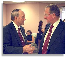 Bill Christison with Chris Hodson, the attorney for the genetic engineering industry, at the Commission hearing.