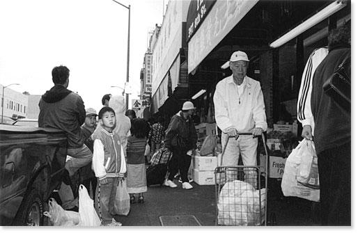 Shopping. Oakland Chinatown. Photo by Bruce Akizuki.