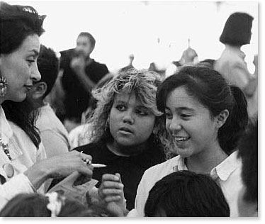 Role model. The actress Rosanna de Soto signs autographs at the event in support of Cesar Chavez' Fast for Life -- 1988. Photo by Nic Paget-Clarke.