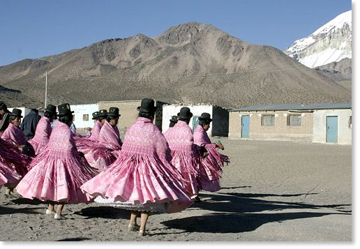 Dancing during a religious festival in the small mountain community of Sajama, by Mount Sajama, Oruro department, Bolivia. Photo by Nic Paget-Clarke. 