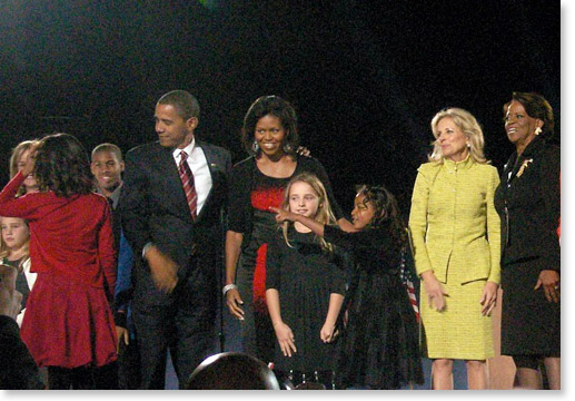 President-elect Barack Obama with his family, and members of Vice President-elect Joe Biden's family at the victory celebration. Photo by Butch Wing.
