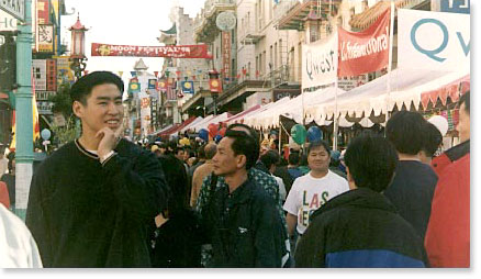 The San Francisco Chinatown Moon Festival is an autumn tradition that attracts thousands of people. Photo by Raymond Wang / Youth Photo Workshop. 1998.