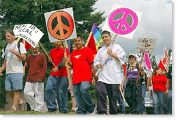 Members of the youth group La Lucha march into Woodburn, Oregon.